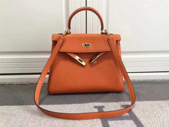 Hermes Kelly Mini leather Orange handbag for women - 1