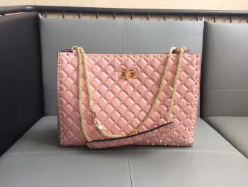 Valentino original lambskin spike tote bag in Pink