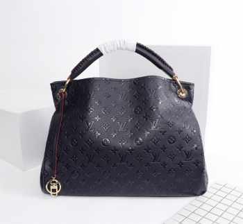 Louis Vuitton Artsy Monogram Empreinte embossed leather Handbag